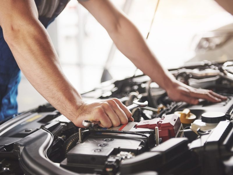auto-mechanic-working-garage-repair-service