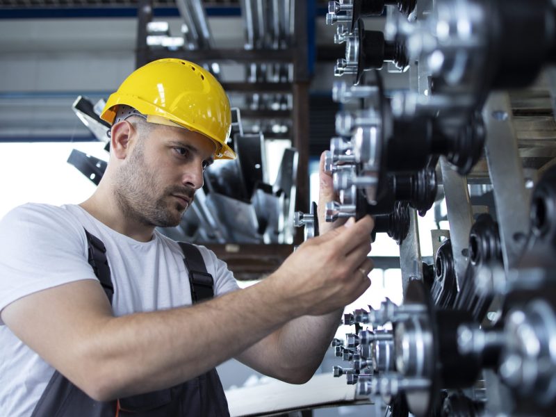 industrial-worker-working-production-line-factory